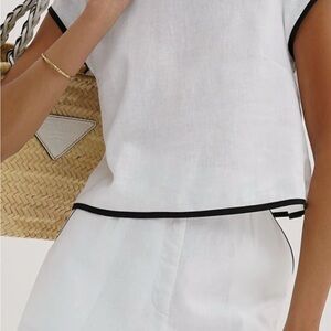 White Sleeveless Top with Black Trim
